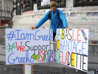 Pancarte A bas le chantage de la dette