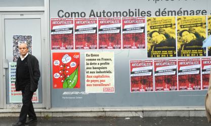 Affiches du Npa sous la pluie du 1er mai 2015