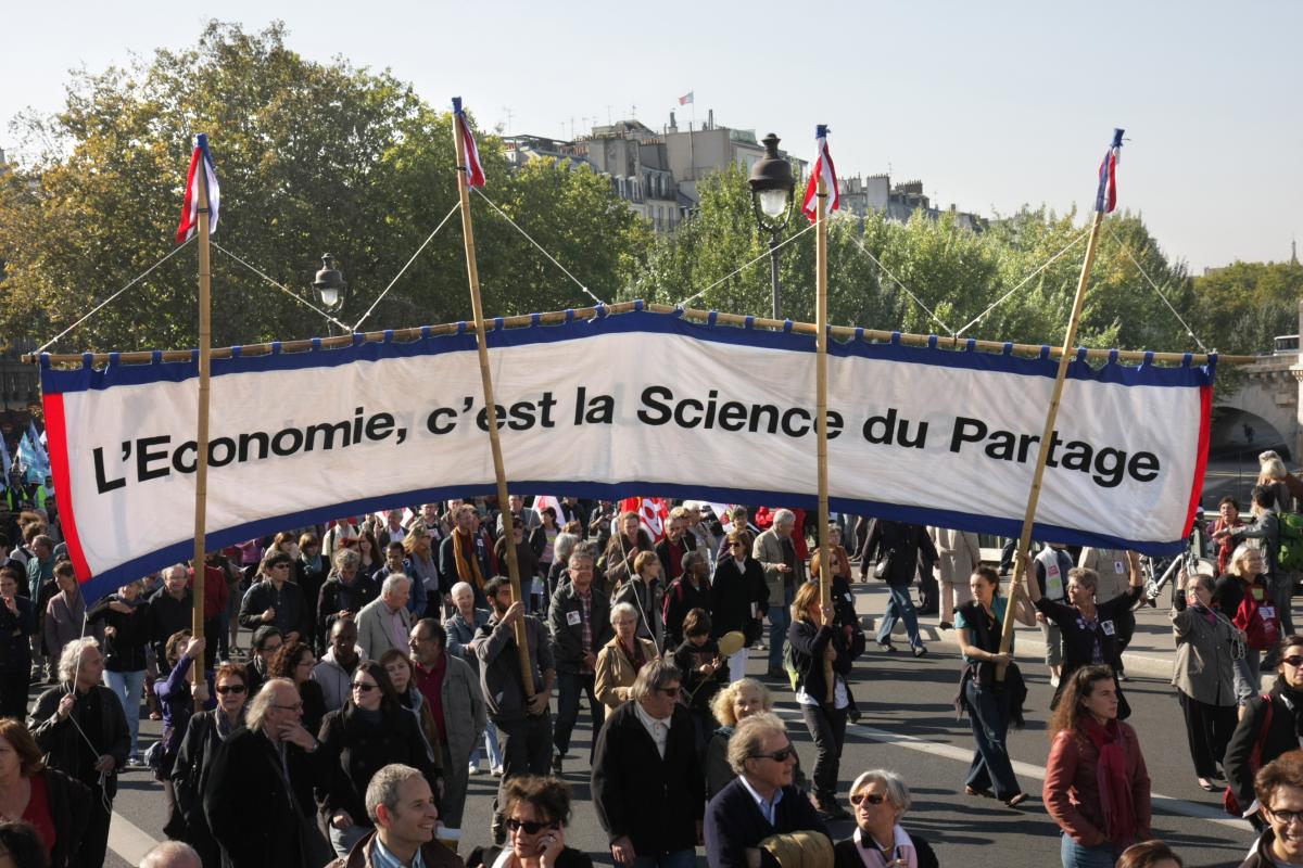 banderole l'économie c'est la science du partage