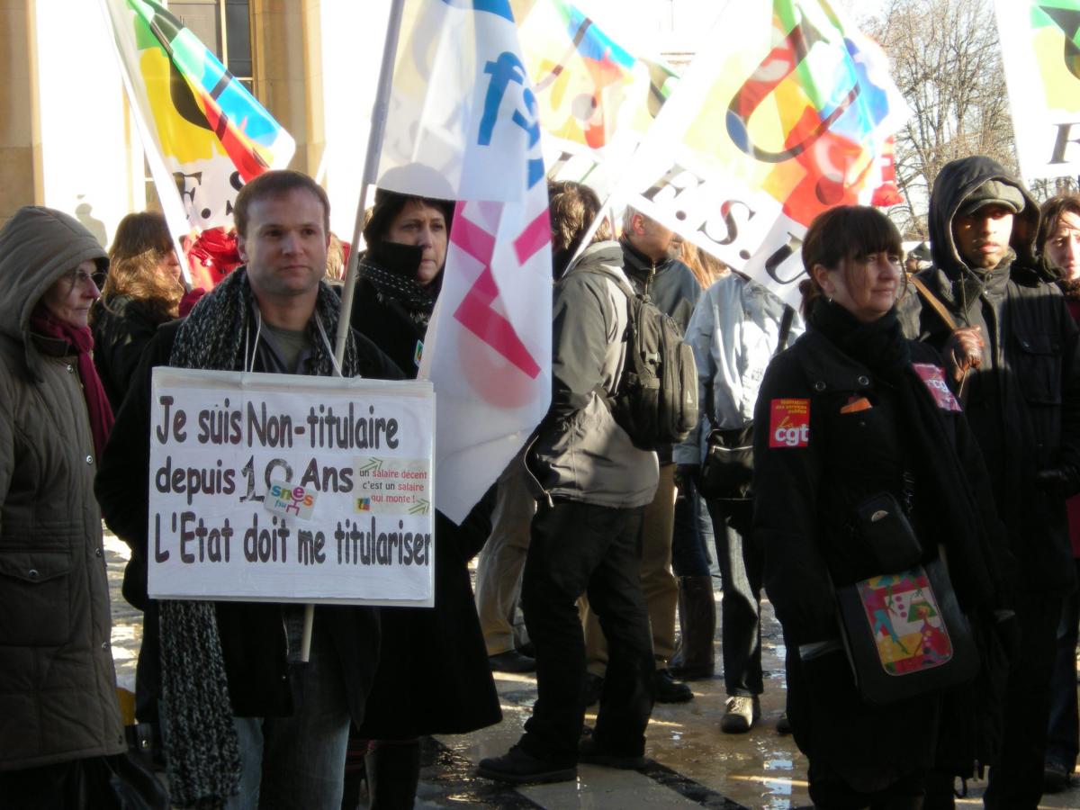 Participant avec une pancarte