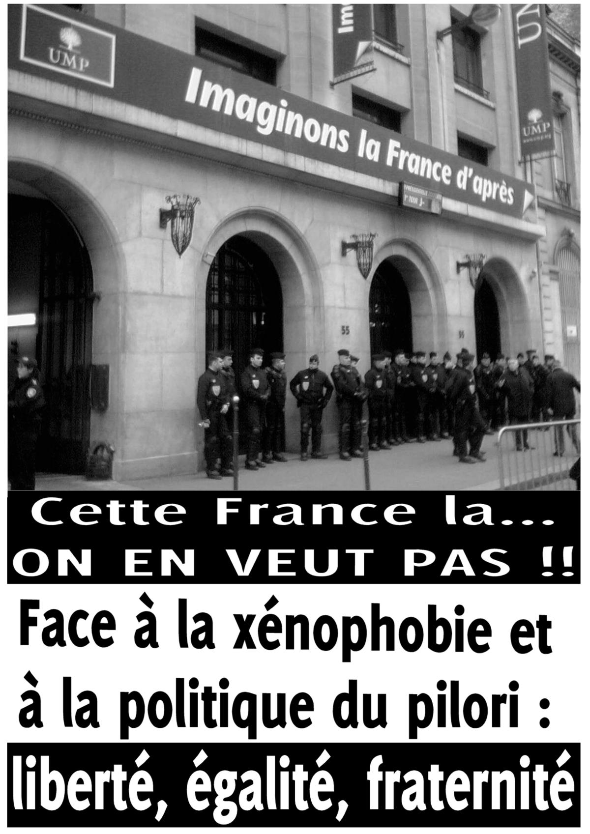 pancarte contre la xénophobie et la politique de Sarkozy