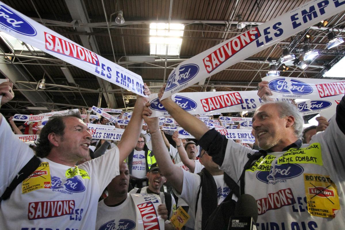La descente des escaliers pars les salariés de Ford