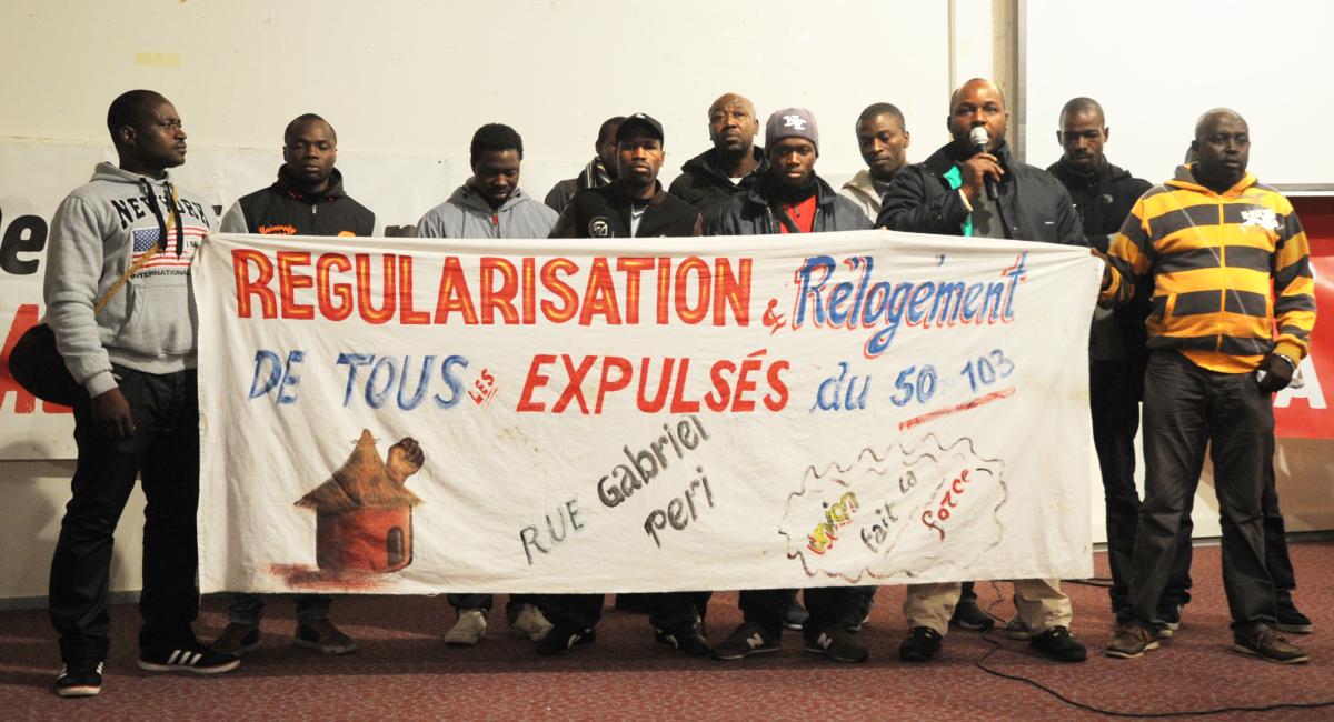 Banderole régularisation de tous les expulsés du 50 et103 rue Gabriel Péri