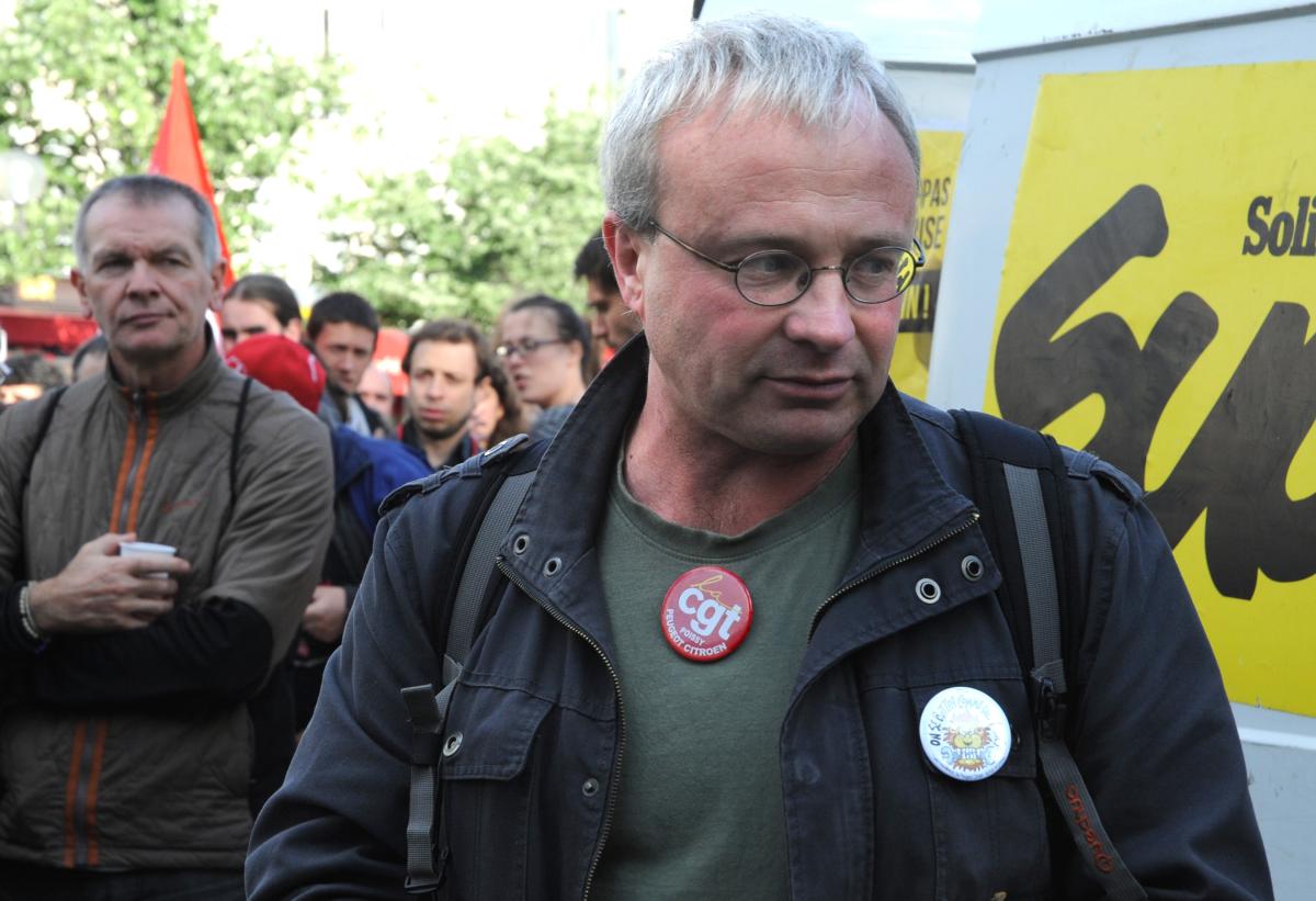 Jean-Pierre Mercier syndicaliste Cgt à PSA Lutte ouvrière au rassemblement devant le Ministère des finances pour demander la réintégration de Yann Le Merrer