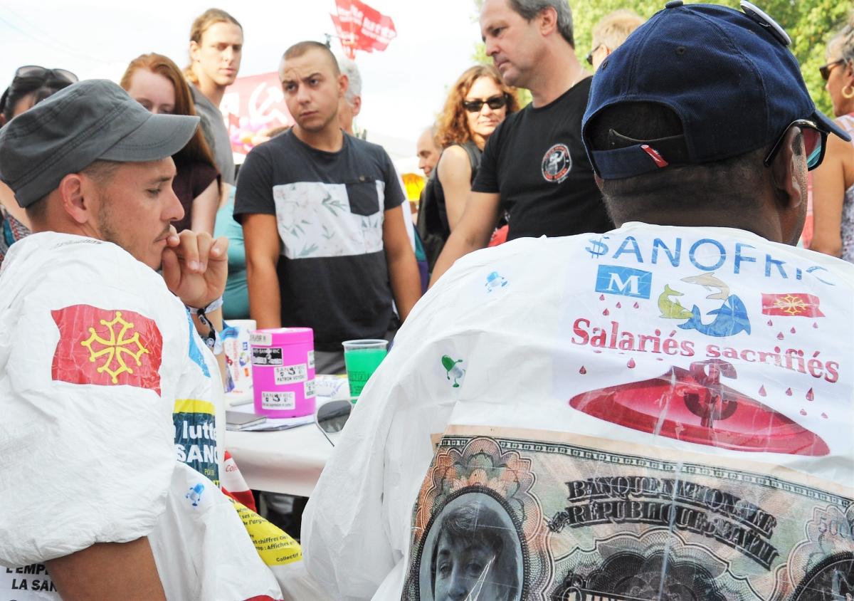 Stand du Npa les Sanofi entreprise de l'industrie pharmaceutique en lutte