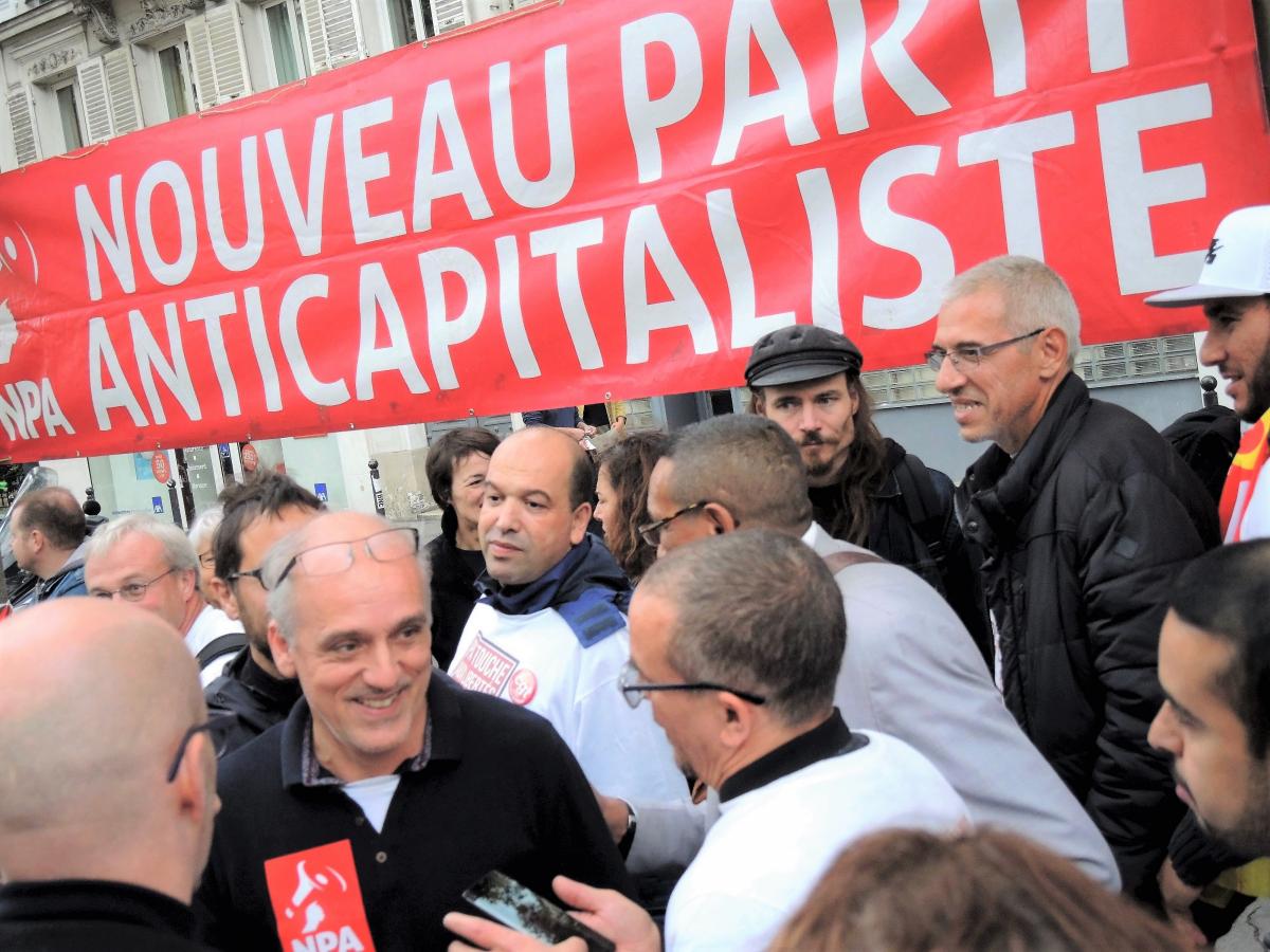 Philippe Poutou avec Jean-Pierre Mercier syndicaliste Cgt à PSA et Farid Borsali secrétaire du syndicat CGT sur le site Peugeot Citroën Automobile de Poissy