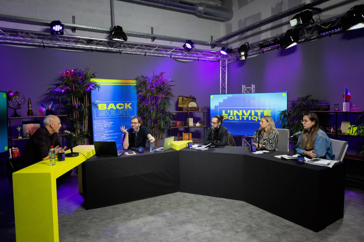 FRANCE - POLITICS - ELECTION - PHILIPPE POUTOU ON BACKSEAT BROADCAST